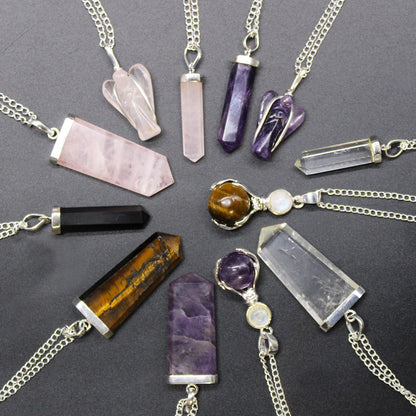 Pendant in the shape of a flat gemstone crystal - rose quartz.